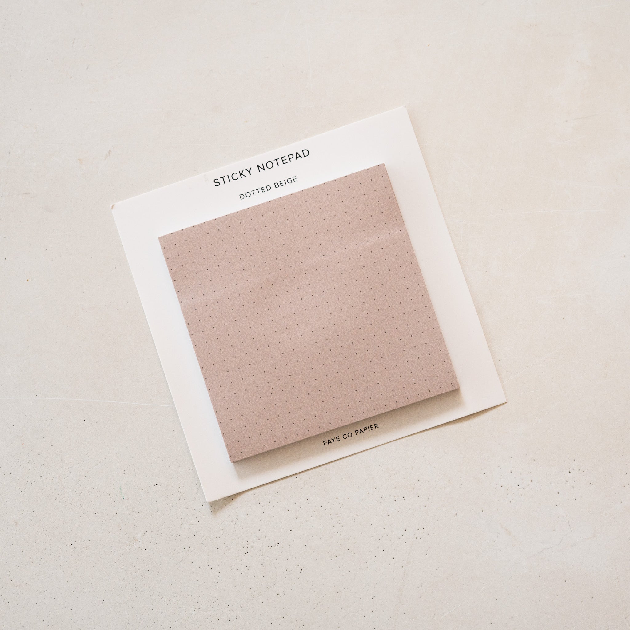 dotted beige sticky notepad 