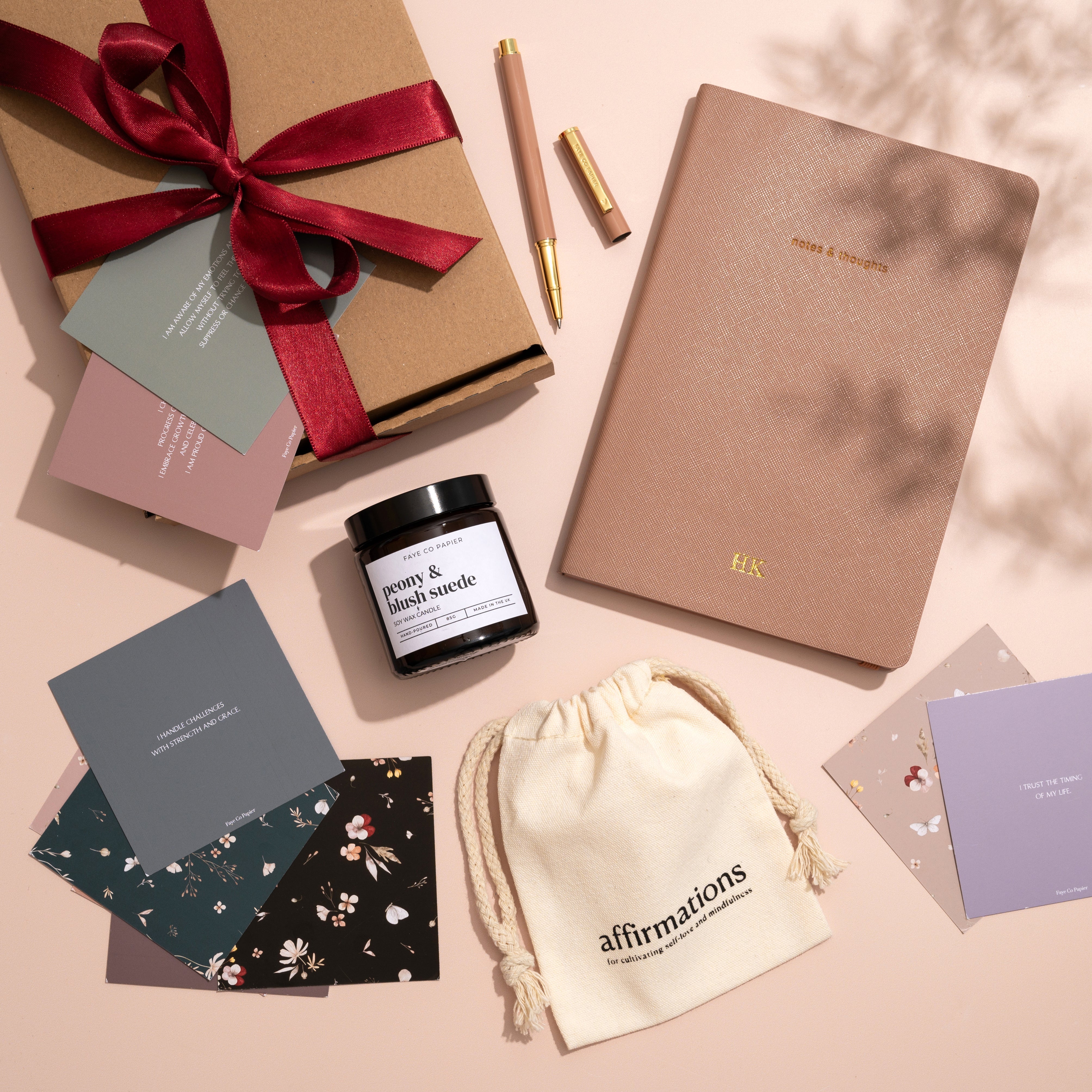 Personalised Stationery Gift set with a notebook, candle, affirmation cards, and a pen
