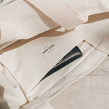 Minimal Unplugged Tote Bag interior showing pockets and label, highlighting its functional and versatile design for everyday use.
