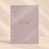 A single sheet of pale lavender paper with three punched holes on the left side and centered text reading, 'A FRESH START (ISN'T A NEW PLACE / it's a new mindset)' with 'FATE CO PAPER' at the bottom planner dashboard