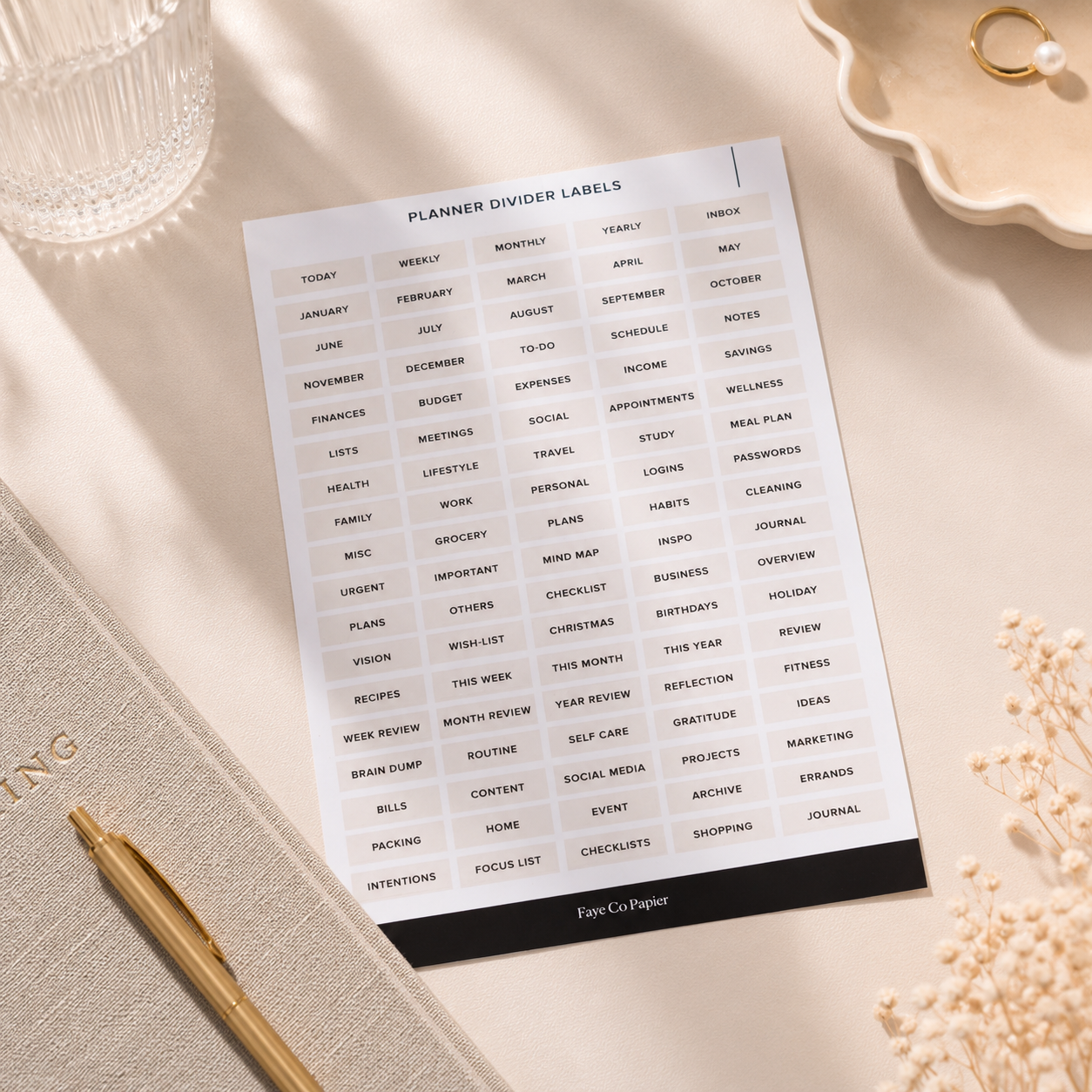 Minimal A5 planner divider labels on a beige background for organising planner tabs, journals, notebooks and ring binder inserts.