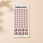 A sheet of circular spotlight stickers in a dusty rose color, labeled 'spotlight sticker' with 'PEONY' and 'CIRCLE' at the top and 'FATE CO PAPER' at the bottom,