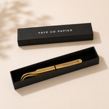 Gold metal tweezer with curved tips and 'FAYE CO PAPIER' engraved on the handle, Sticker Tweezer | Precision Tweezers for Planner Stickers and Journaling
